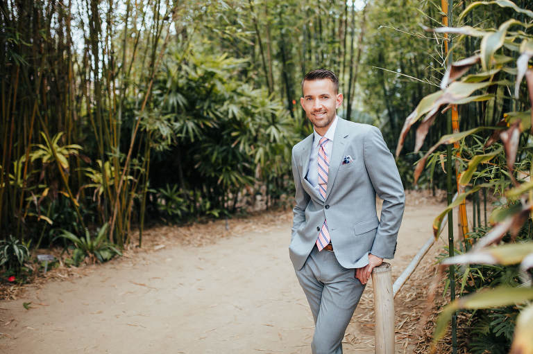 portrait of groom smiling at camera